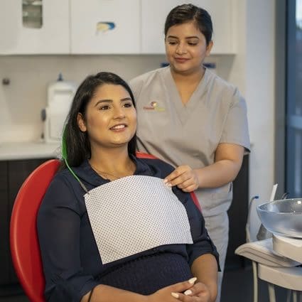 dental-assistant-with-patient